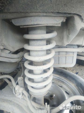 Пружина задняя Джили Эмгранд се7