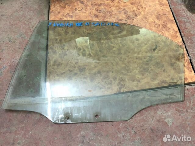 Стекло задней левой двери Daewoo Nubira