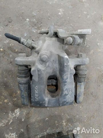 Суппорт задний Toyota Corolla 150