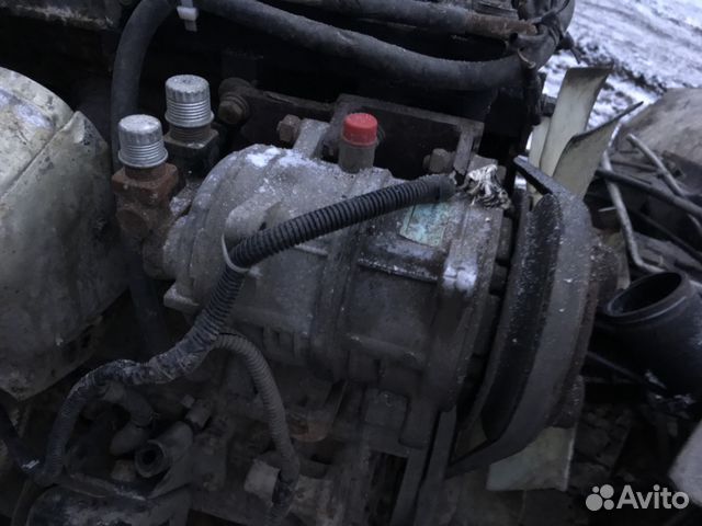 Isuzu elf компрессор кондиционера на 4hl1 б.у Isuzu elf компрессор кондиционера на 4hl1 б.у