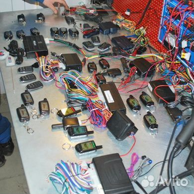 Программатор брелков автосигнализаций. Кнопки на брелке сигнализации. Ремонт автосигнализаций рядом со мной. Ремонт брелоков автосигнализаций. Установка сигнализации новоуральск.