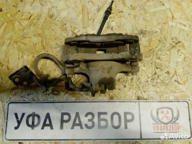 Суппорт передний левый Mitsubishi Lancer X