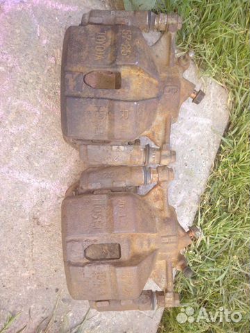 Тормозной суппорт toyota carina e, 2шт пр-лев, пер Тормозной суппорт toyota carina e, 2шт пр-лев, пер