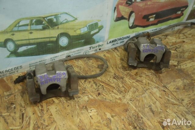 Суппорт тормозной зад Тойота Камри 40