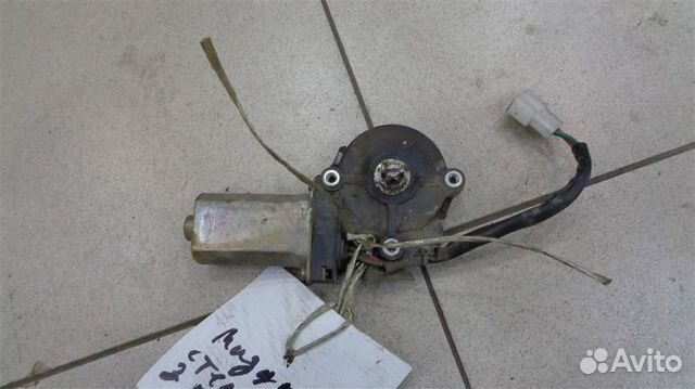 Моторчик стеклоподъемника задний левый Mazda 626