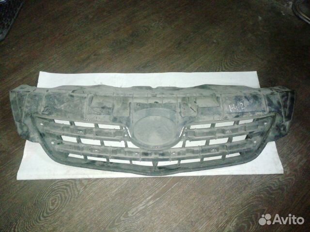 Решетка радиатора передняя Toyota Corolla 150