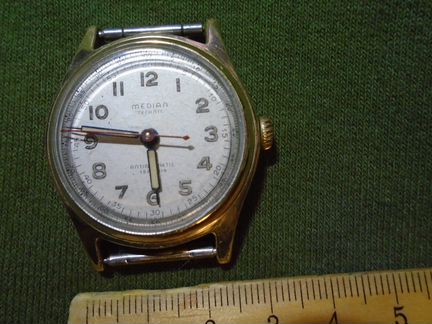 Швейцарские позолоченные часы 50-х годов 20 века