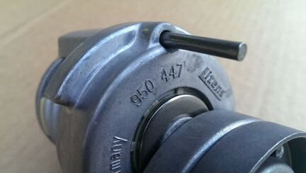 Новый натяжитель приводного ремня Фольксваген Ауди