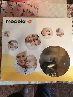 Молокоотсос medela swing электрический